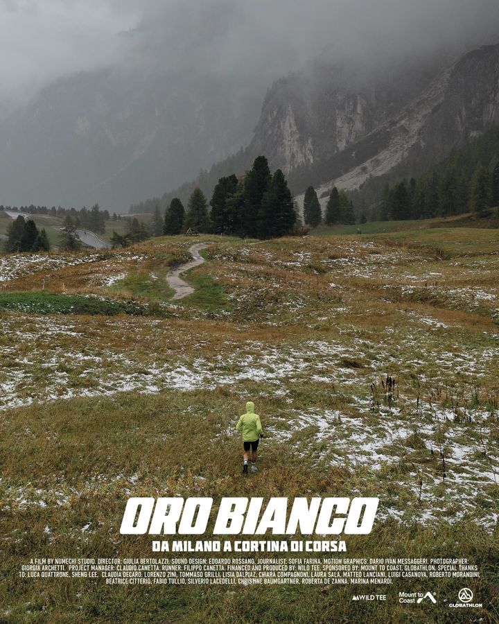 Locandina del docu-film Oro Bianco, un runner in un prato di montagna